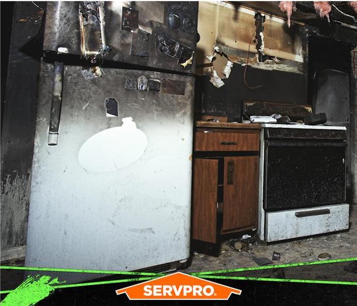 fire damage to kitchen and fridge