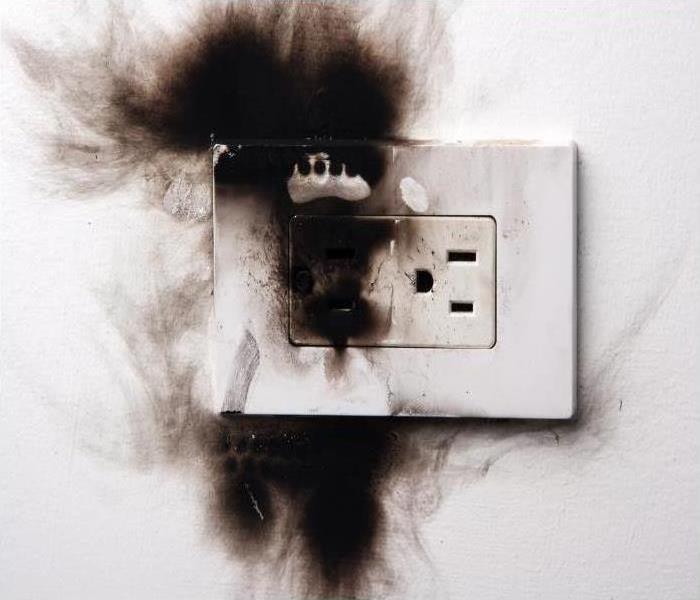 Wall Outlet with Fire Damage